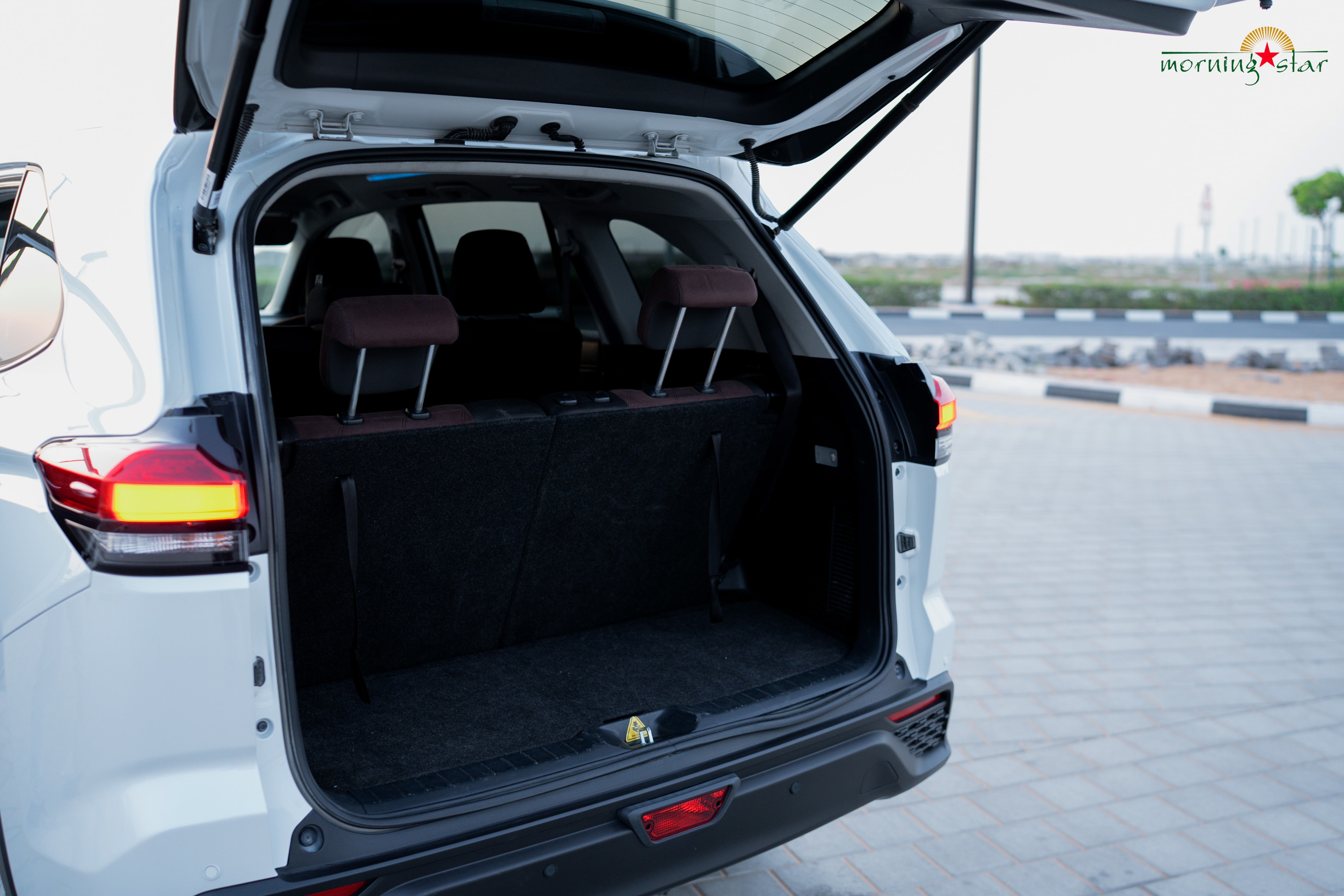 Toyota Innova Hycross boot open side view — Morning Star UAE