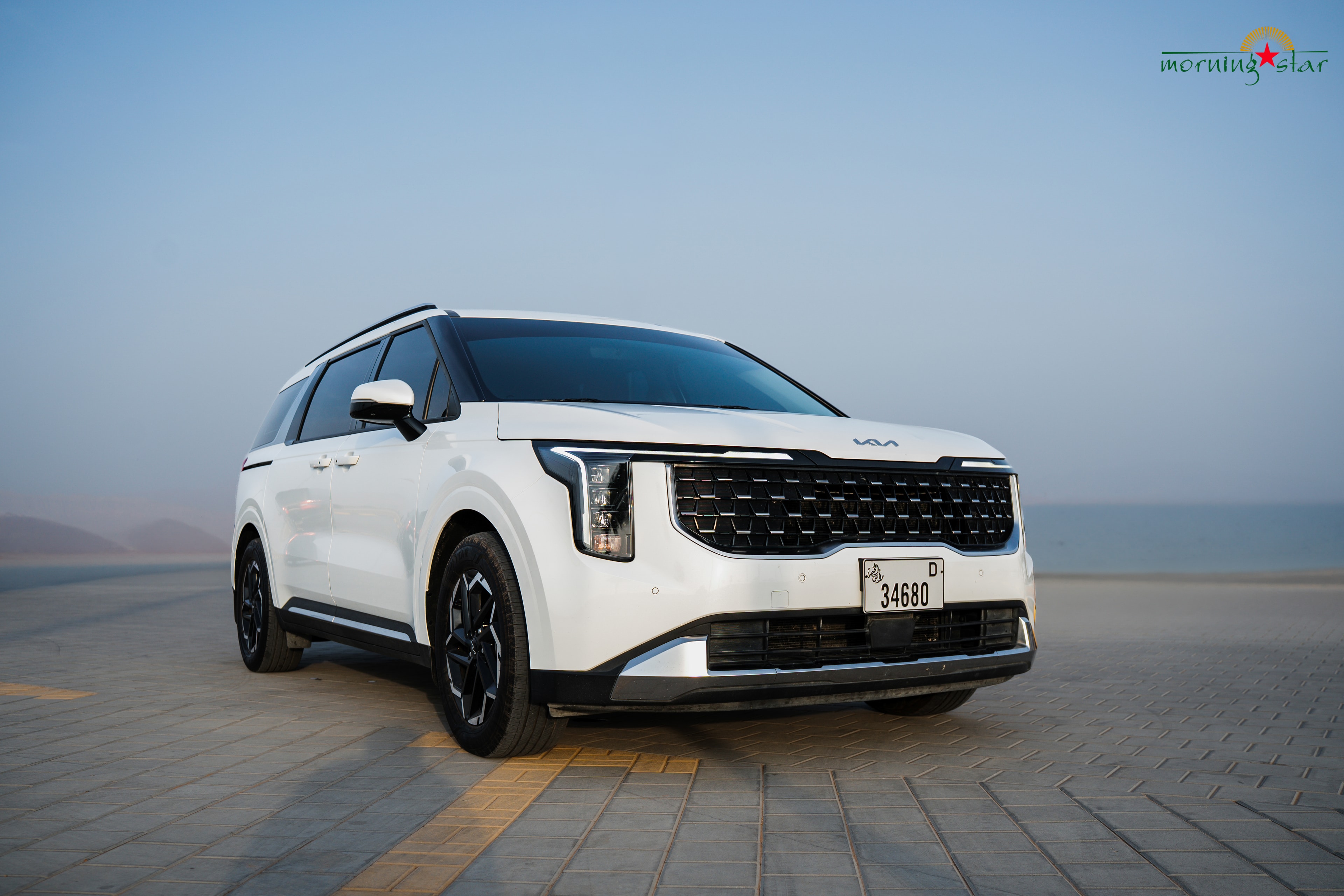 Kia Carnival front waterfront — Morning Star UAE