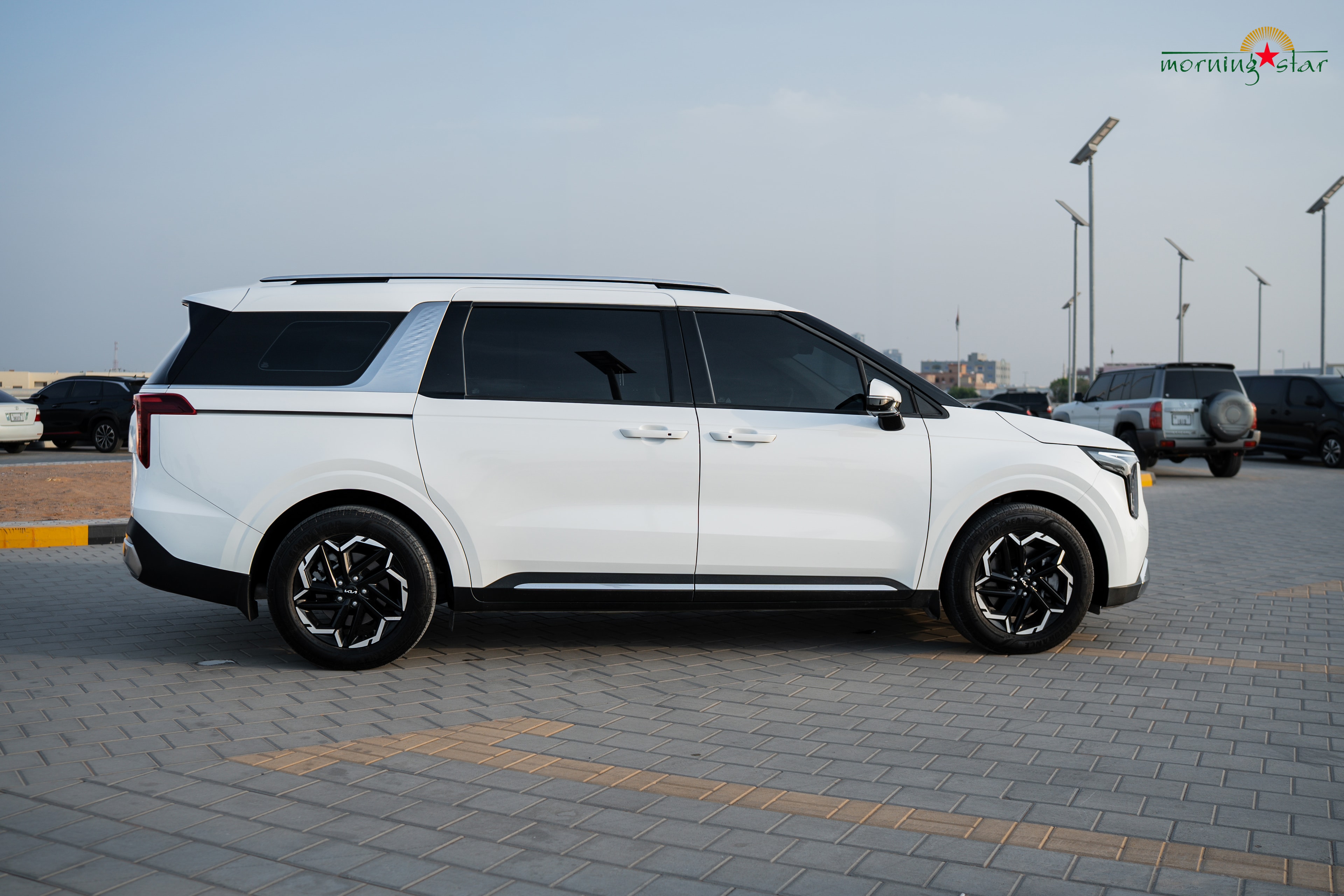 Kia Carnival side view — premium passenger vehicle UAE